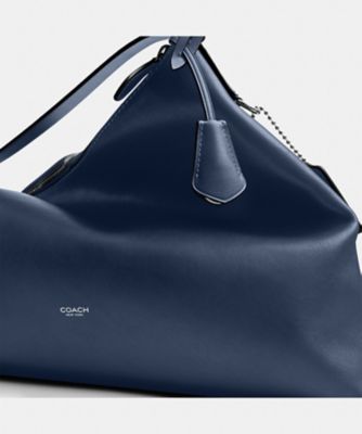 モット メッセンジャー バッグ 38 | COACH/コーチ | 三越伊勢丹
